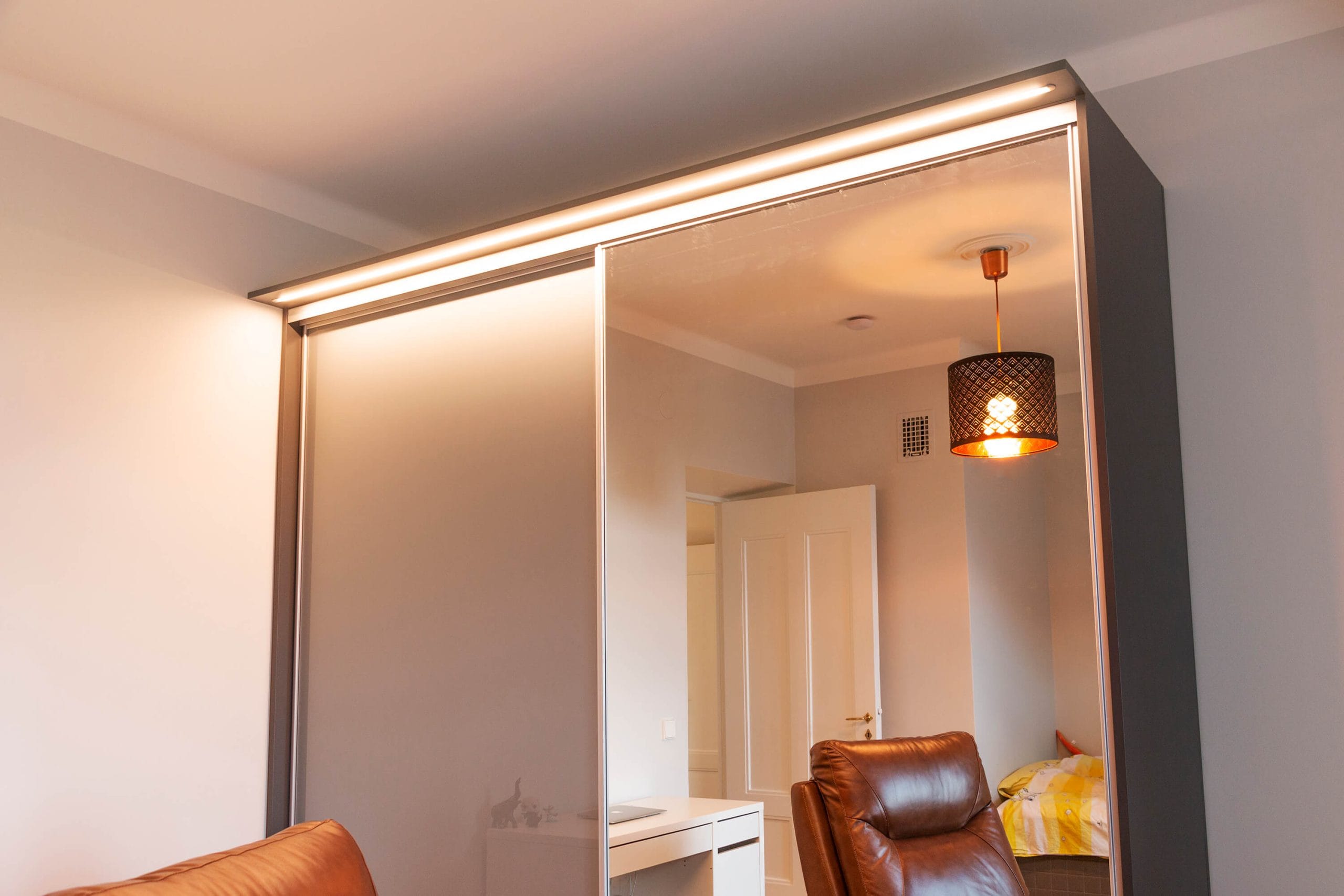 Led-ribbon mounted on the top lip of a wardrobe, LedStore.fi