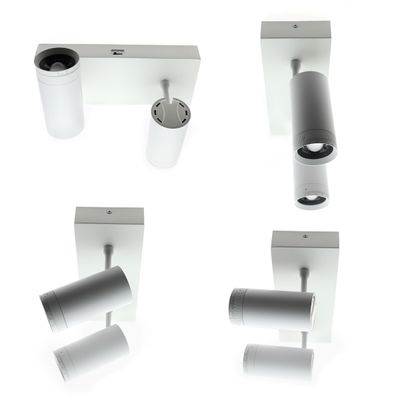 Testo alternativo: 'Faretto bianco orientabile con luci cilindriche su base rettangolare - quattro diverse viste dell'esposizione di luci LED nel negozio.