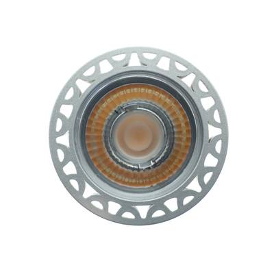Lampada LED rotonda, montatura argentata, anello d'accento arancione, componente di illuminazione ad alta efficienza energetica su sfondo bianco.
