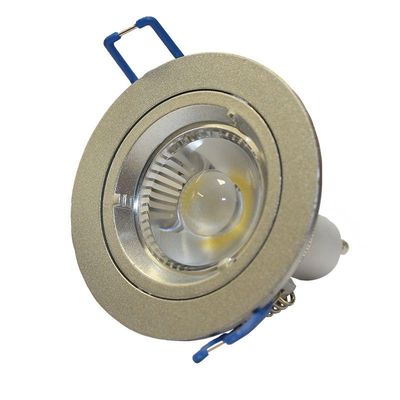 Primo piano di una lampadina LED da incasso di colore argento con base e supporti blu, ideale per soluzioni di illuminazione ad alta efficienza energetica.