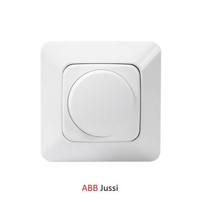 Interruttore a parete ABB Jussi bianco per illuminazione a LED, pulsante rotondo e base quadrata, design moderno.