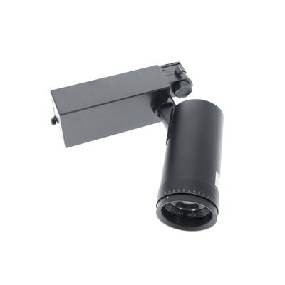 Moderna lampada a binario nera con lampada cilindrica su base rettangolare, inclinata su sfondo bianco per una soluzione di illuminazione elegante.