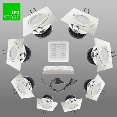 Luci LED rettangolari da incasso in cerchio con telecomando e cablaggio. Nell'angolo è presente il logo verde "LED STORE".