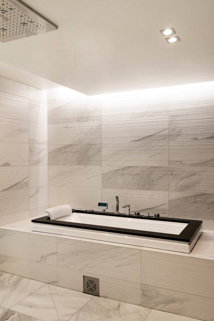 Grafica LED Store: uno sfondo verde con un quadrato bianco al centro con il testo "LED STORE" in grassetto bianco per promuovere l'illuminazione a risparmio energetico.