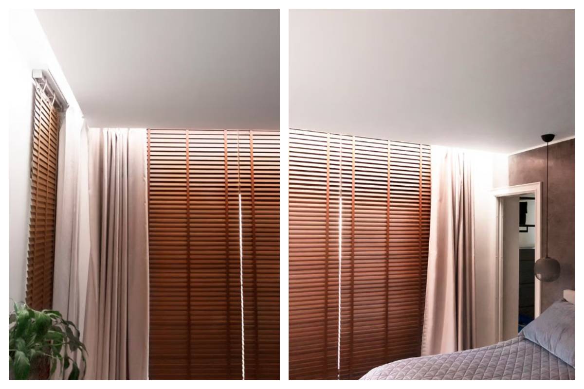 Una moderna camera da letto a Kaitamäki, Espoo: tende in legno, tende beige, verde e un letto ben fatto creano l'atmosfera di una tranquilla casa di famiglia. Il tutto è completato dall'illuminazione a LED di LedStore.fi, progettata con cura, che enfatizza l'intimità e lo stile dello spazio.