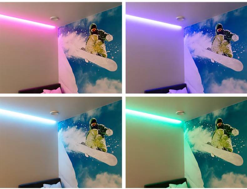 Un murale a tema snowboard, animato dalle luci LED di LedStore.fi in colori intercambiabili - rosa, viola, blu e verde - crea uno schema di illuminazione spettacolare e dinamico nella casa di una famiglia di Espoo a Kaitamäki.