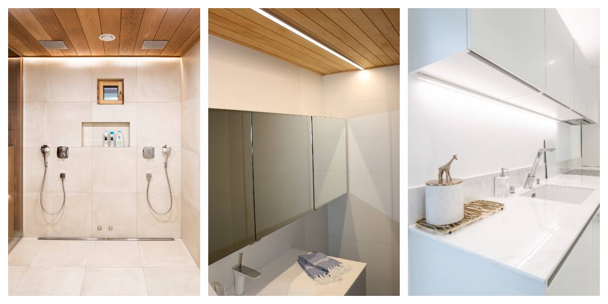 Tre bagni dal design moderno: il bagno arredato ha una doccia semplice con due soffioni e luci LED incassate; il bagno privato mostra uno specchio e un lavabo minimalista; il terzo ha un elegante piano con articoli da toilette e una scultura di giraffa. Tutta l'illuminazione è stata realizzata con soluzioni LED di LedStore.fi.