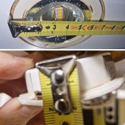 Una lampada con un metro in cima che mostra un diametro di 7 cm.