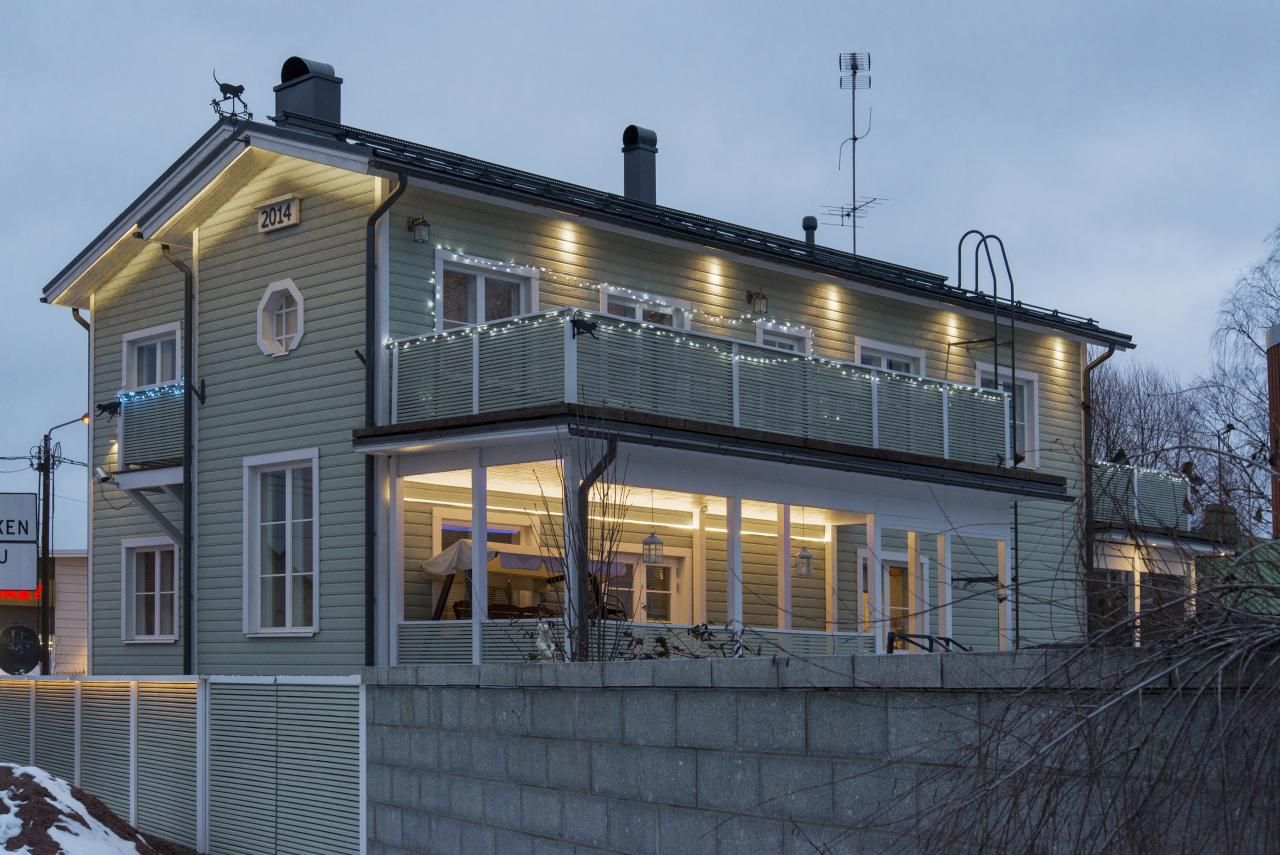 Insegna LED STORE con lettere maiuscole bianche su sfondo verde e un quadrato bianco che rappresenta il marchio del negozio di illuminazione a LED.